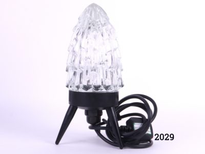 1960s Rocket shaped lamp with three legged black plastic base and a glass shade Measures 125mm in circumference at base Main photo showing whole lamp