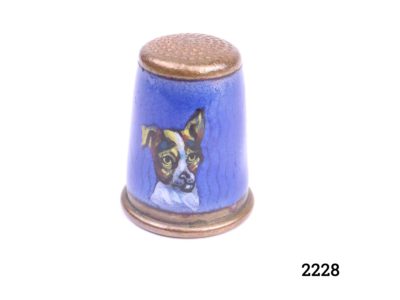 Vintage copper thimble with hand-painted Jack Russell terrier on blue enamel Opening measures 17mm in diameter Main photo showing side view of thimble with portrait of Jack Russell