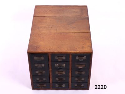 Vintage wooden index card cabinet with 15 metal drawers Each drawer measures 540mm long by 100mm wide and 65mm deep Main photo of cabinet from a front slightly raised angle