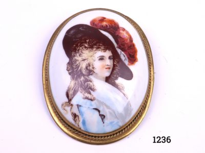 Vintage pinchbeck set brooch. Victorian ceramic brooch in a pinchbeck mount with a hand-painted image of a lady in the style of Thomas Gainsborough Main photo of front image of brooch