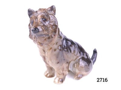 Small Royal Doulton Cairn terrier dog Brown and black gloss finish Model number K11Y (Under glaze scuff to right ear) Main photo showing dog from a side angle with head to the left and head facing to camera