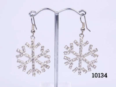 Vintage costume jewellery snowflake earrings encrusted with sparkly crystals throughout, Each snowflake measures 32mm in diameter. Earring drop length from top of earring hook 48mm Main photo of earrings on a display stand and seen from the front