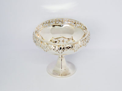 Art Deco sterling silver tazza. Very sweet tazza with pierced work to the top of the bowl. Made by Adey Bros Ltd of Birmingham and dates to 1927. Full hallmark to the outside of bowl. Measures 55mm in diameter at base and 95mm at opening at top. Photo showing tazza from a slight raised angle