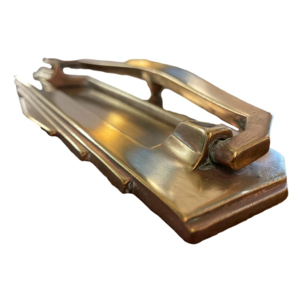 Photo of letter slot from a side angle with the top Deco design facing bottom left.