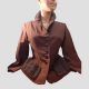 Main photo of the entire jacket seen from the front and modelled on a mannequin. Fitted waist again as were the jackets of way back then. Warm chocolatey brown main body with darker brown pockets and collar in a fleece like fabric. A style that never goes out of style.
