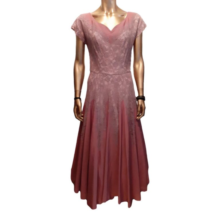 Main photo showing the full length of dress from the front. The dress is displayed on a gold tone mannequin without head.