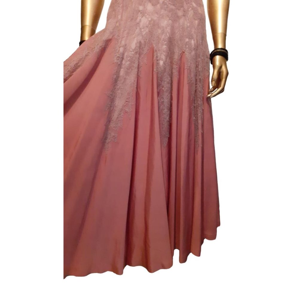 Photo of the skirt area with the left side of skirt pulled out to the side showing the full skirt.