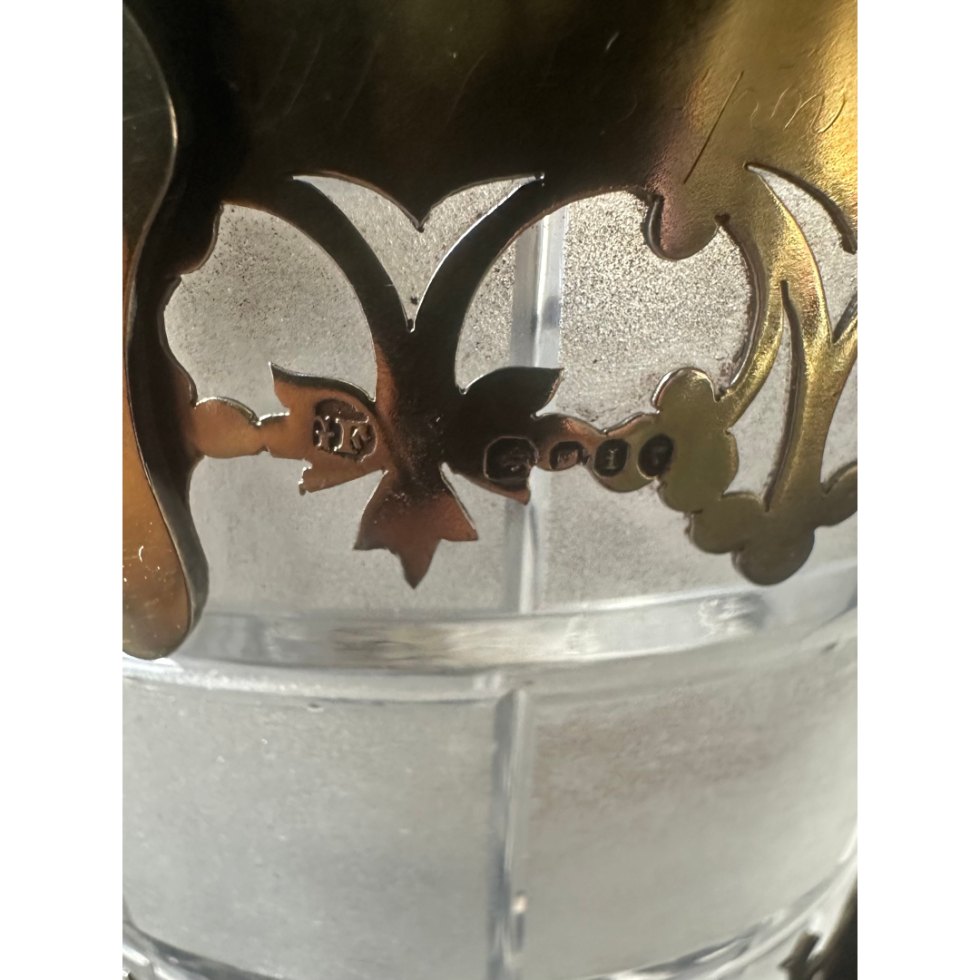 Close up photo of the hallmark on the gilt silver at top of bucket.