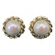 Main photo of earrings displayed side by side. The faux pearls are fairly large with a pinkish tinge with a twist rope work framing them all the way round.