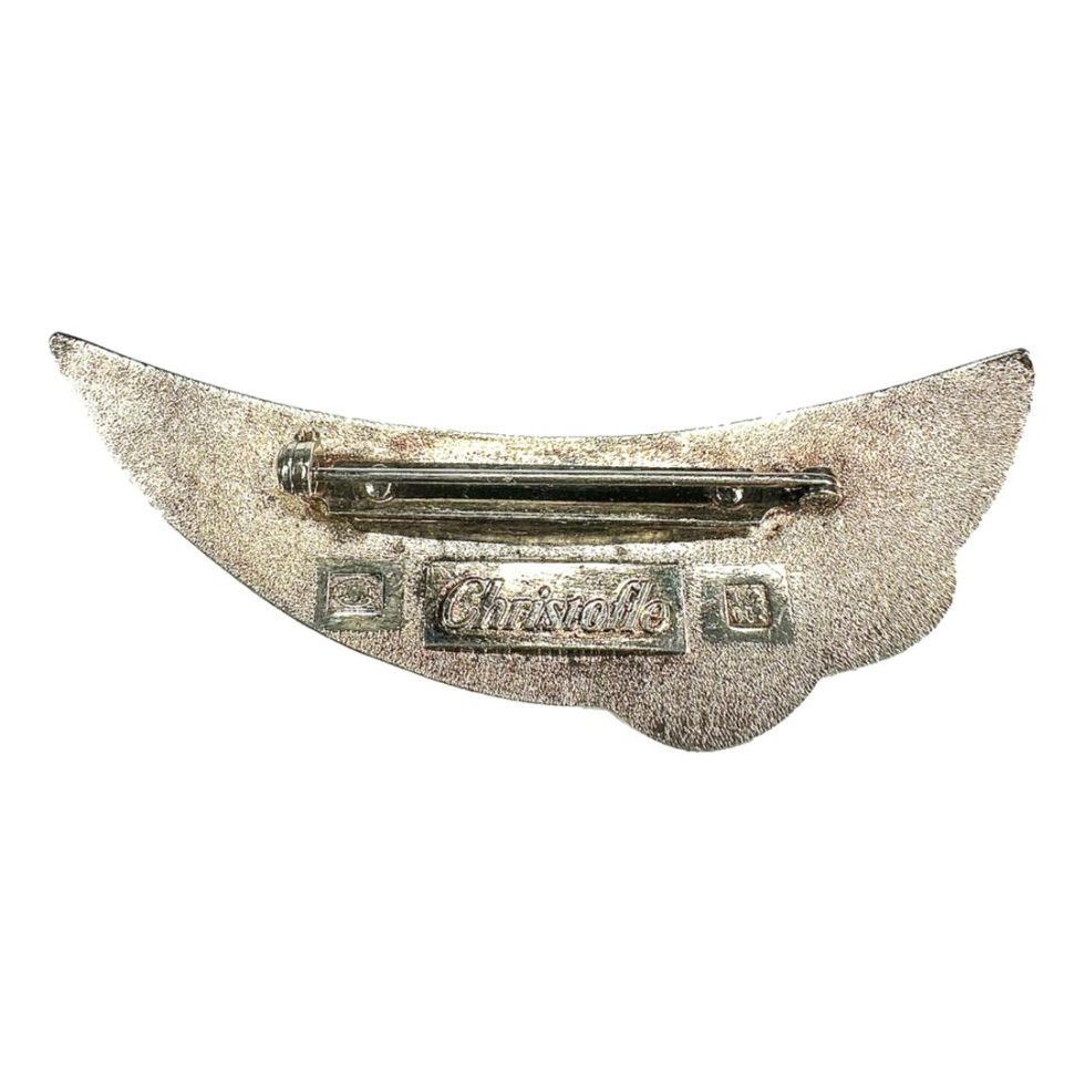 Photo of back of brooch with Christofle signature mark.