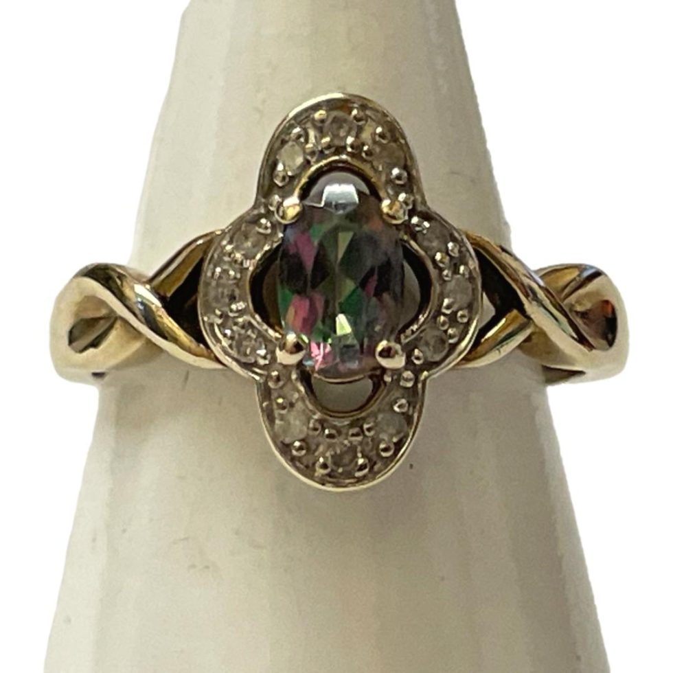 Main photo of ring on a cone shaped stand with the ring front forward facing.