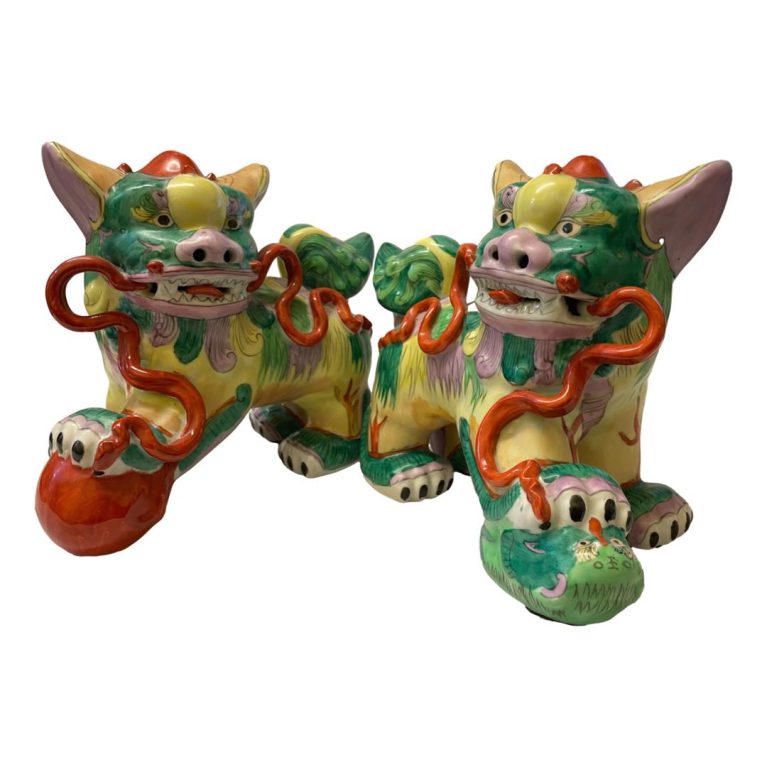 Main photo of both vintage colourful foo dogs shown side by side and placed facing each other - male to the left with ball female to right with puppy. under their paw.