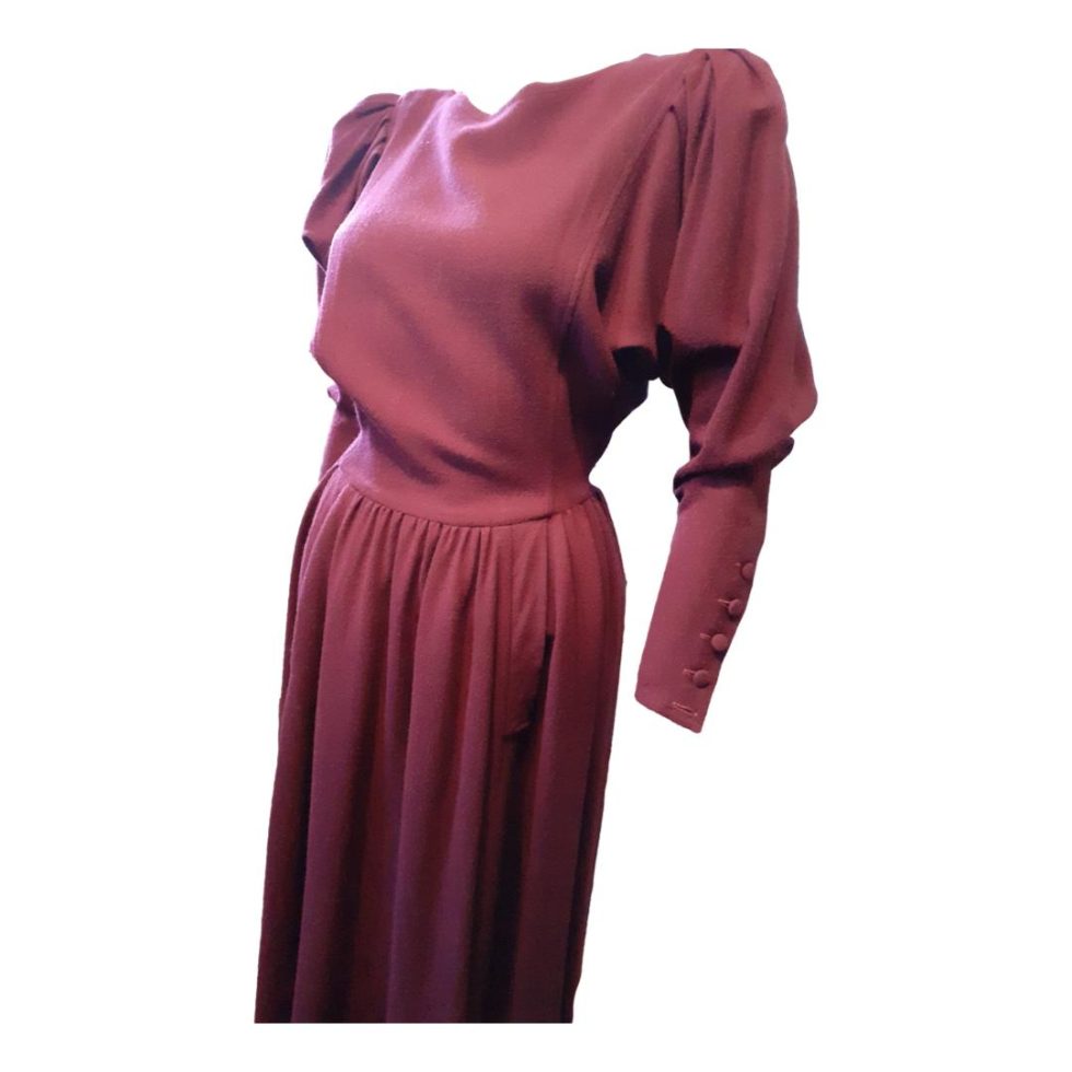 Photo of dress from knees up facing towards the left.