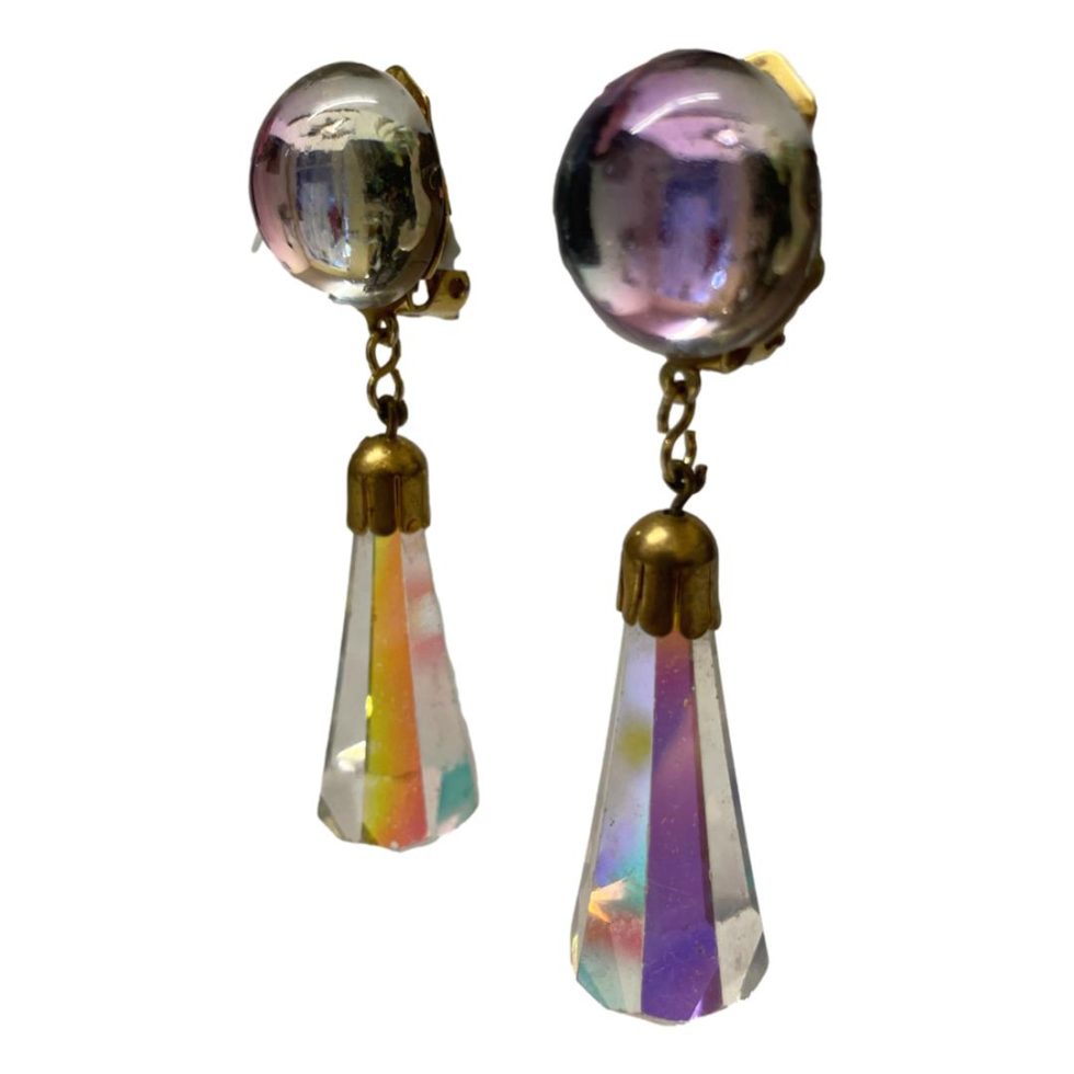 Photo of earrings seen hanging from a side angle - lovely colours on display in the crystals.
