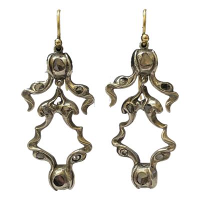 Antique earrings in 18 karat gold and silver with old mine rose cut diamonds. No hallmark but dates to around 1700s.                                      Drop length approximately 40mm from top of hook and 16mm at widest. Main photo of both earrings shown dangling and front forward facing.