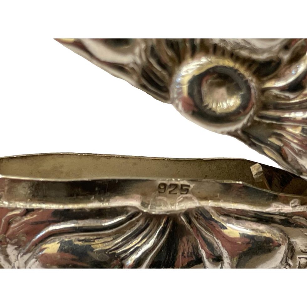 Close up photo of the 925 hallmark on the inside rim below the lid.