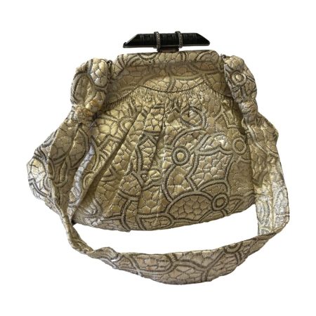 Main photo of bag shown upright and from the full side with handle laid to the front.