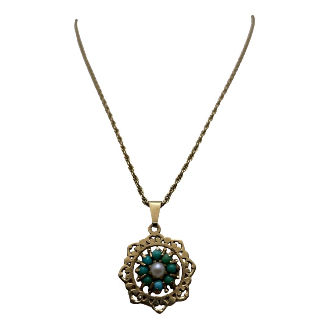 9 karat gold & turquoise pendant on 9 karat gold chain. Vintage 9 karat gold chain with fine pendant also in 9 karat gold and housing a pearl to the centre surrounded by 8 small turquoise stones. Hallmark to top of pendant at back and to both ends of the clasp. Pendant drop length 28mm from top of bail and 22mm wide. Main photo of the necklace shown hanging. Not the whole length of the necklace chain is shown.