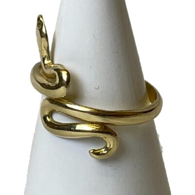 14 karat gold snake ring. Vintage wrap around style snake ring in 14 karat gold. It can be slightly adjusted as the band is not fixed. Lovely when worn with tail and head in opposing edges on the finger. Ring size M / 6. Weight 3.5gms. Photo of ring on a cone shaped stand with the ring front facing left so only the tail end of the snake is really visible.