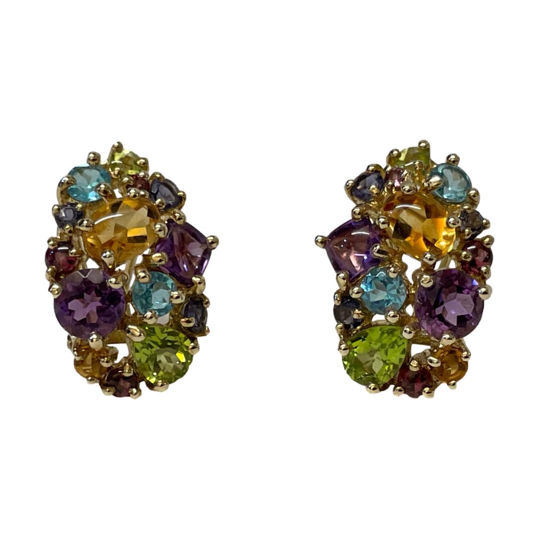 Multi gem earrings set in 9 karat gold. Pair of modern earrings in 9 karat gold set with multiple semi precious gems including amethyst, peridot and citrine. Secure lever back fastening. Hallmarked to the earring posts and hinge base of levers. Earring fronts measure approximately 23mm long by 15mm at widest. Main photo of the earrings displayed side by side on a flat surface showing the generous selection of different gem stones. The earrings are seen looking straight on from the front.