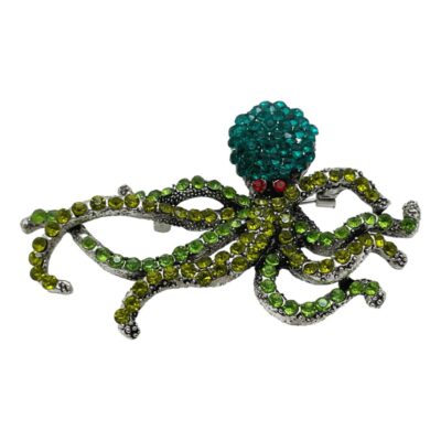 Main photo brooch seen from the front. The octopus has a turquoise green crystal head with red crystal eyes and alternating green and yellow crystal limbs. A truly eye catching brooch!