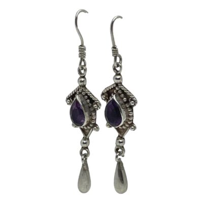 Photo of earrings shown hanging and seen from a slight side angle with the front of earrings facing towards bottom left of photo.