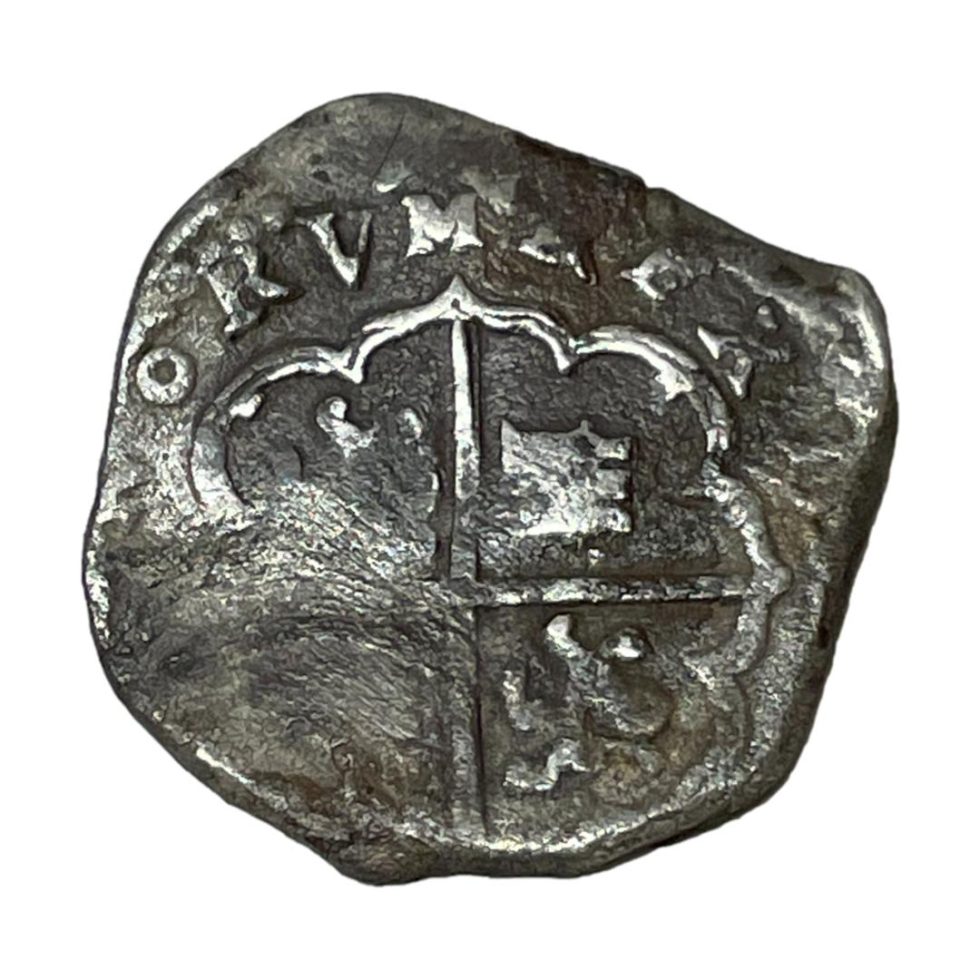 Main photo of c1599 Felipe III coin showing the more prominent side. There is considerable wear to this ancient coin but some areas are still well pronounced.