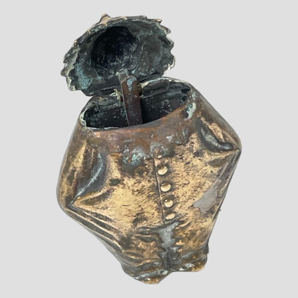 Photo of brass clown vesta shown open (basically a headless clown