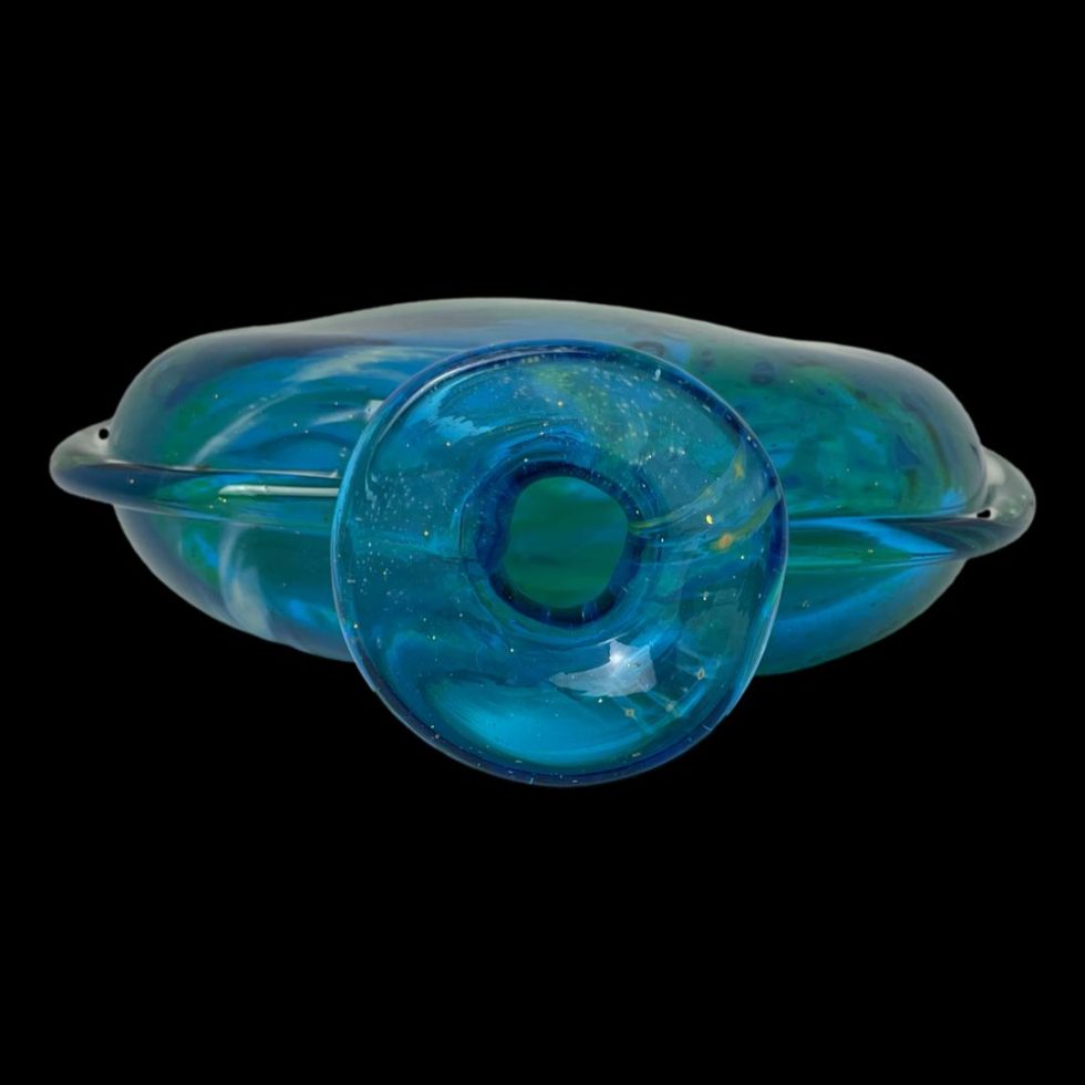 Photo looking down at unsigned Mdina glass vase from above and straight down. The mouth has a circular lip around it.