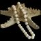 Main photo of antique white coral necklace displayed draped over a starfish. The coral beads are a lovely natural white with small flecks of pale pink and the knotting between each bead is visible.