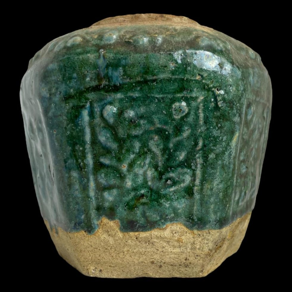 Photo of 19th century ginger jar from an eye level showing the beautiful shiwan green glaze
