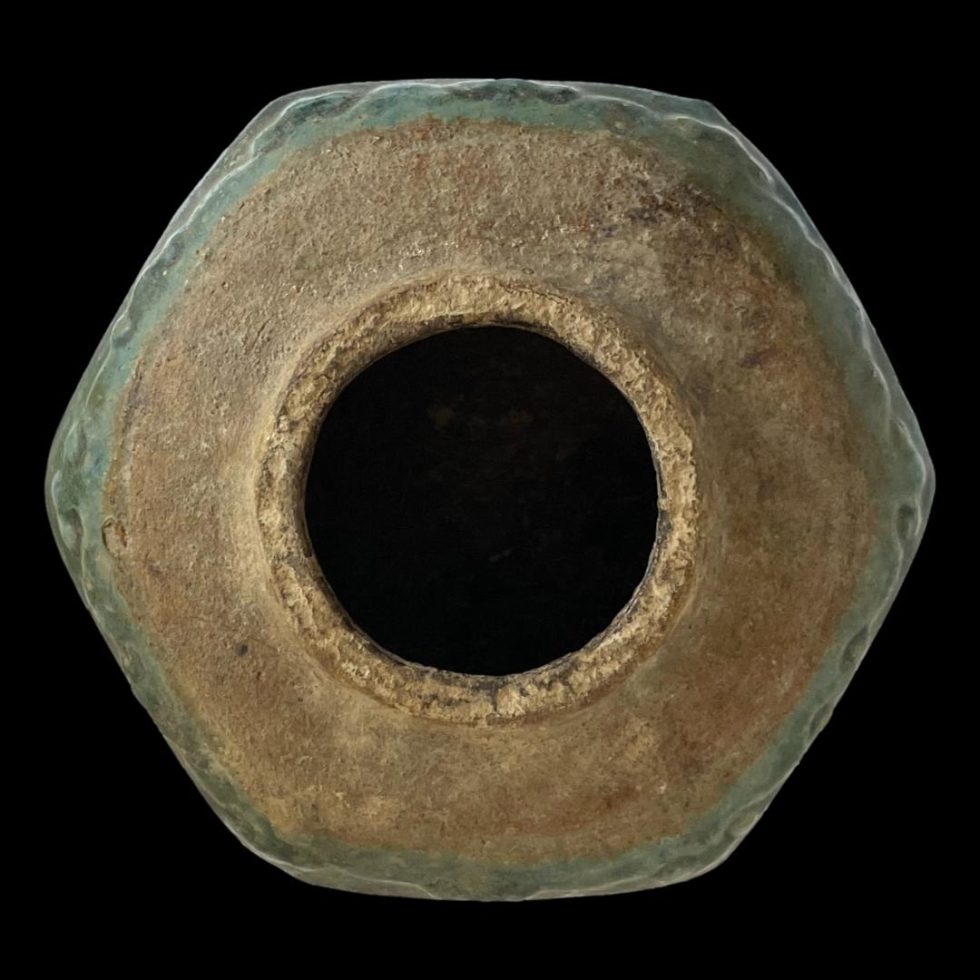 Photo looking straight down at the top of 19th century ginger jar . The hexagonal shape of the pot is clearly visible whilst the pot opening at top is circular.