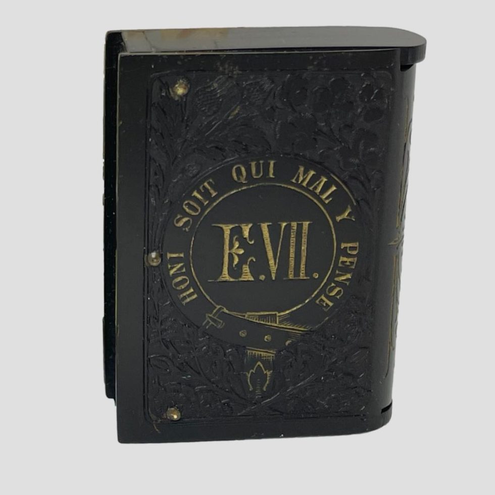 Photo of Edward VII bakelite vesta showing the E.VII side which strangely can look like it reads EVIL - funny that!