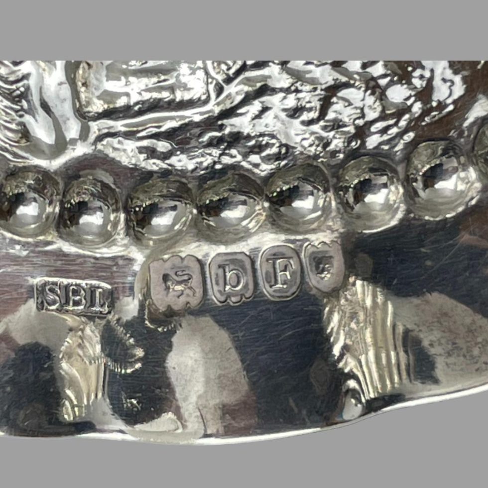Close up photo of the London import assay hallmark on the right of the spoon bowl of the Dutch silver ladle spoon.