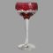 Main photo of etched cranberry wine glass seen from an eye level. The bowl of the