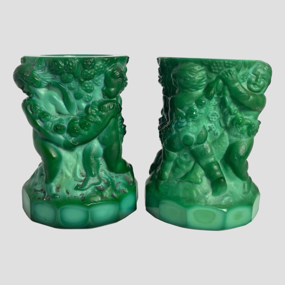 A final area of cherubs dancing around the malachite glass putti pots.