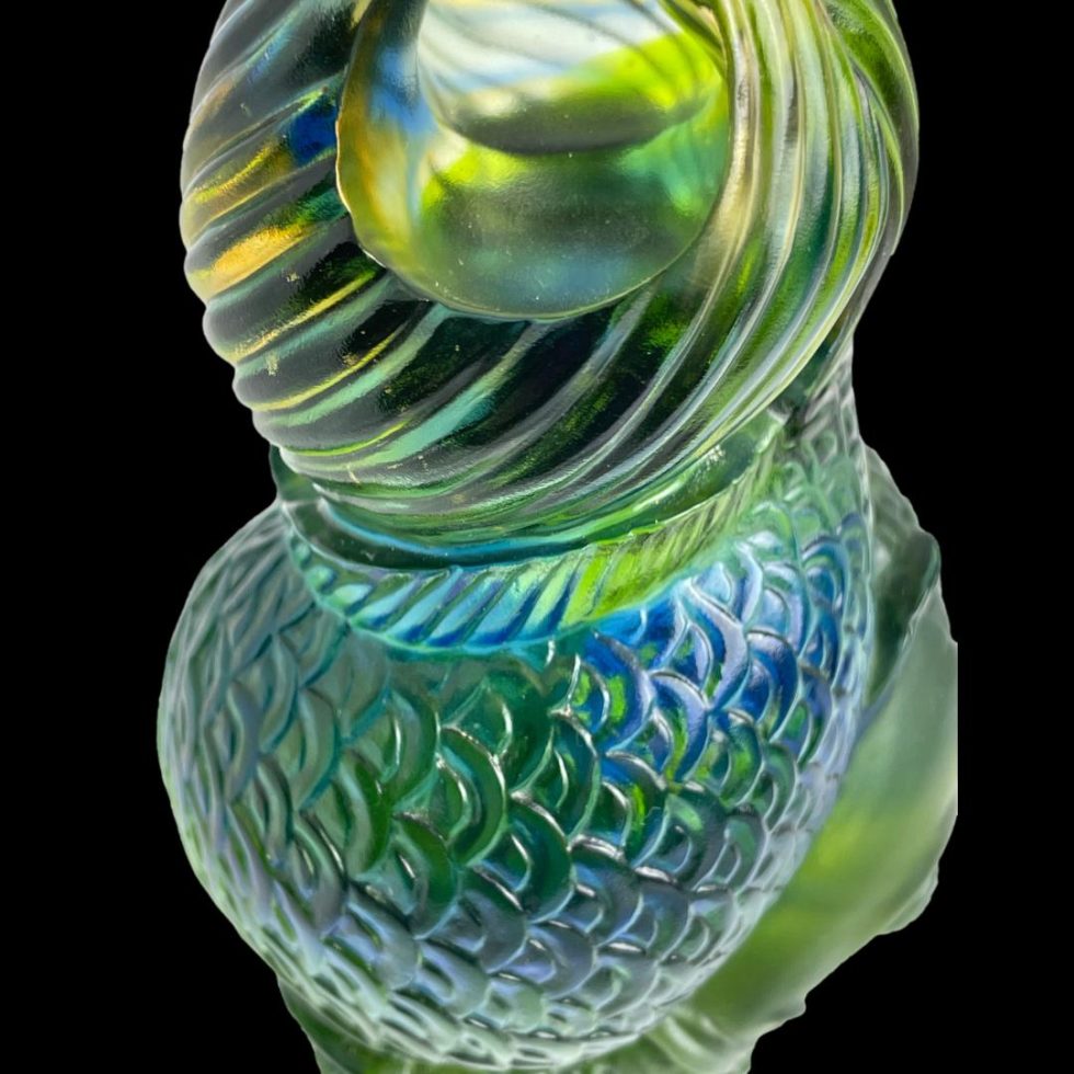 Photo looking through the naturally created handle of the fish tails.