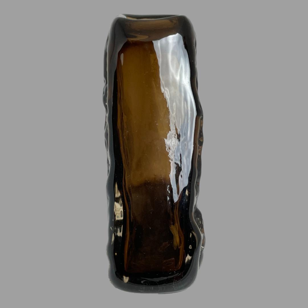 Photo of Whitefriars pyramid bark vase seen from the thin side angle where the glass is untextured and smooth.